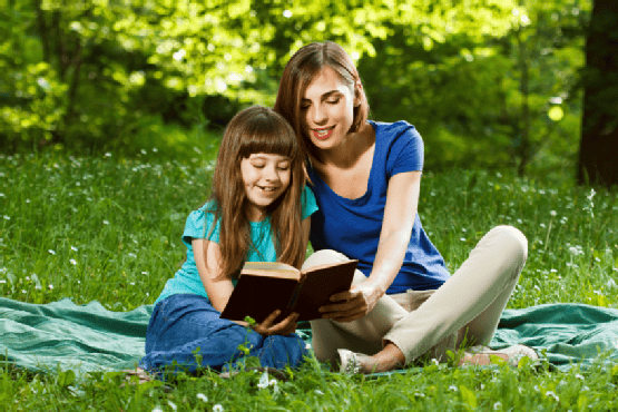 Mother and daughter reading a book