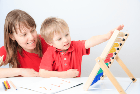 mother and son playing with abacus